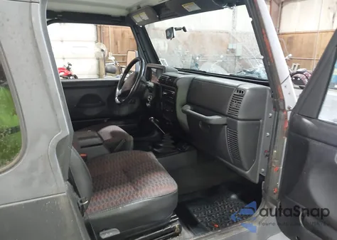 2000 Jeep Wrangler Sport z USA, uszkodzony, nr VIN 1J4FA49S4YP753434